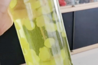 pulp juice filling in glass bottle